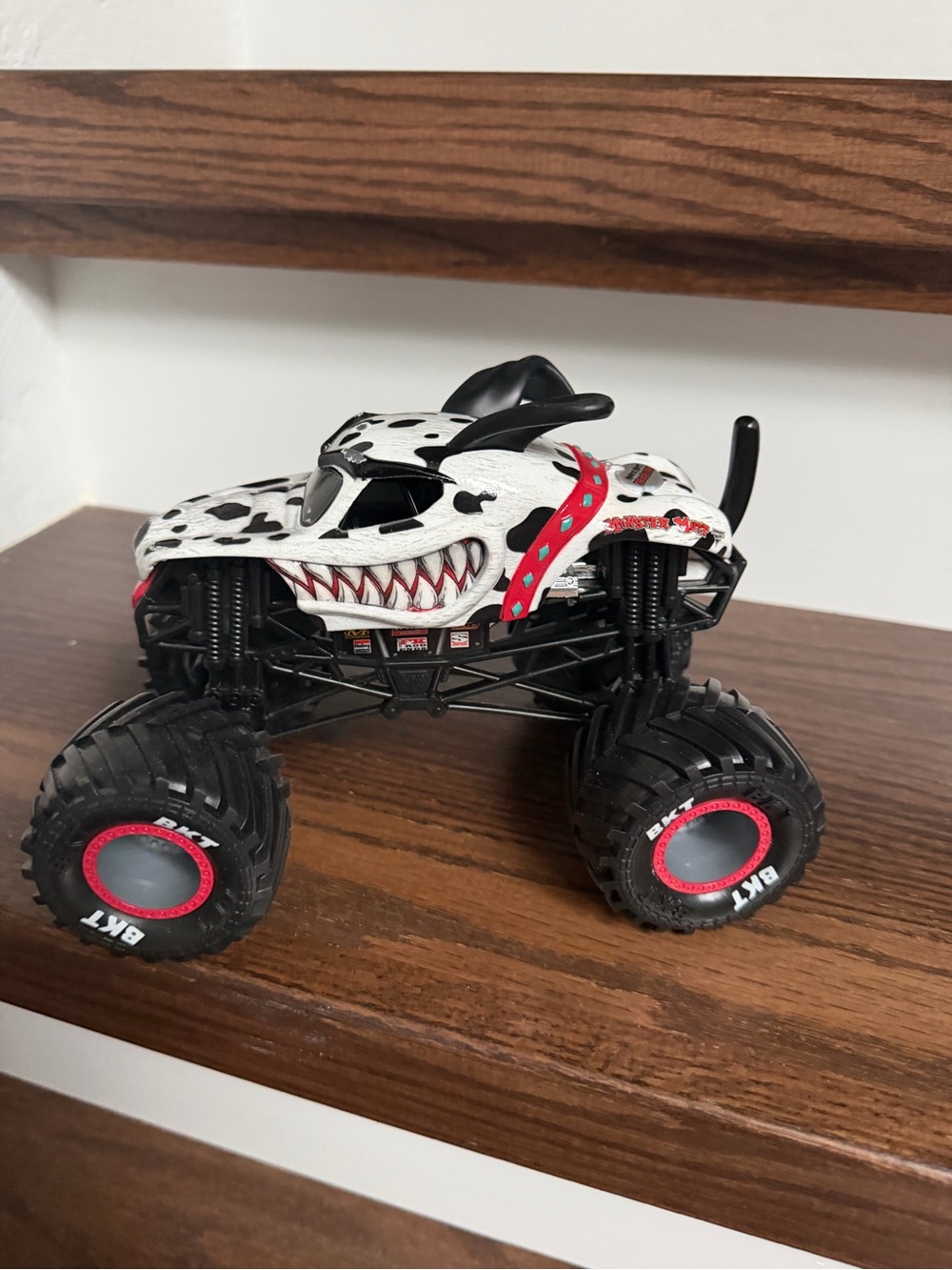 Dalmatian-Style Monster Truck Toy - White and Black with Red Accents